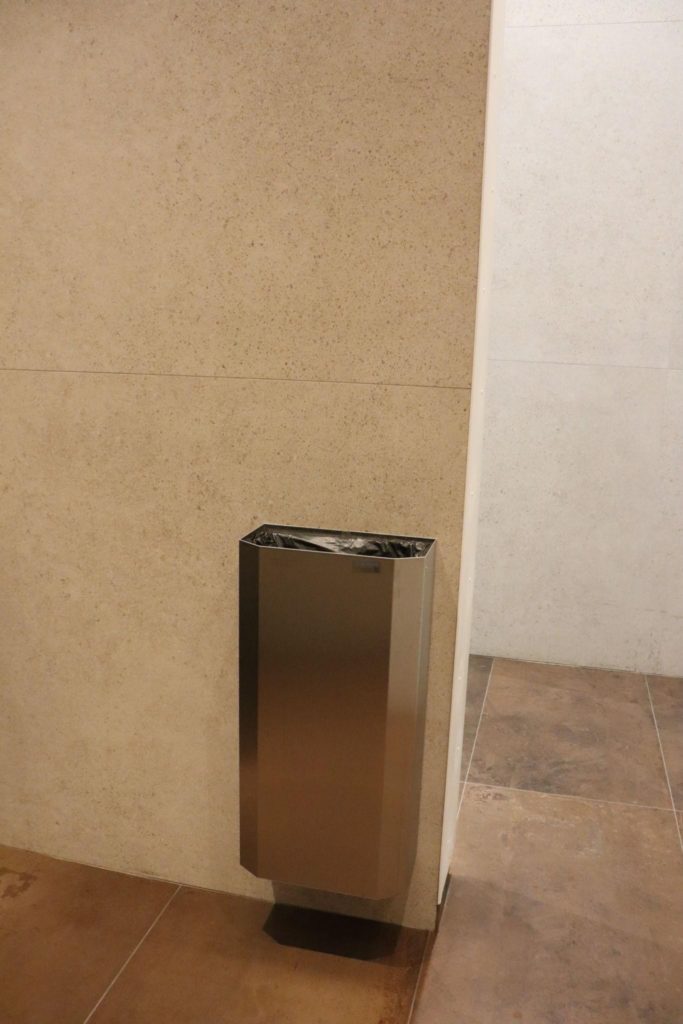 Wall-mounted trash bins